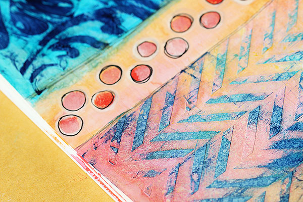 Adding texture to art journaling with stencils by Lisa Spangler