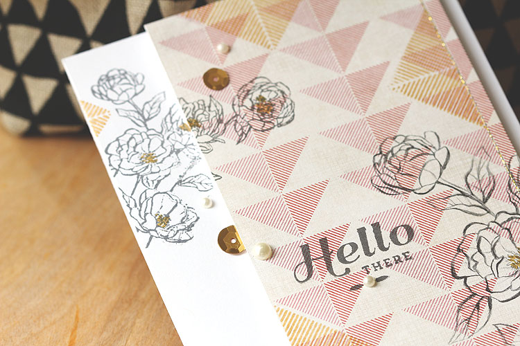 Stamp on patterned paper by Lisa Spangler