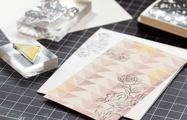 Stamp on patterned paper by Lisa Spangler