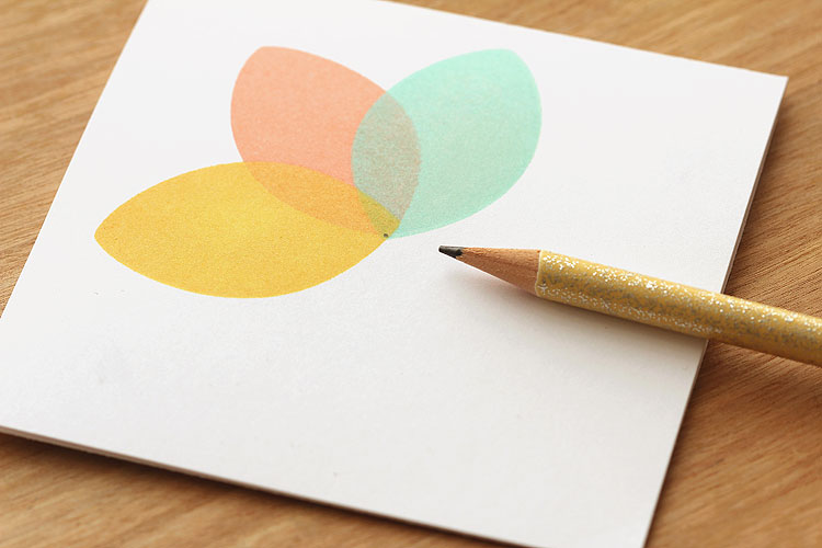 Start by making a dot with a pencil...